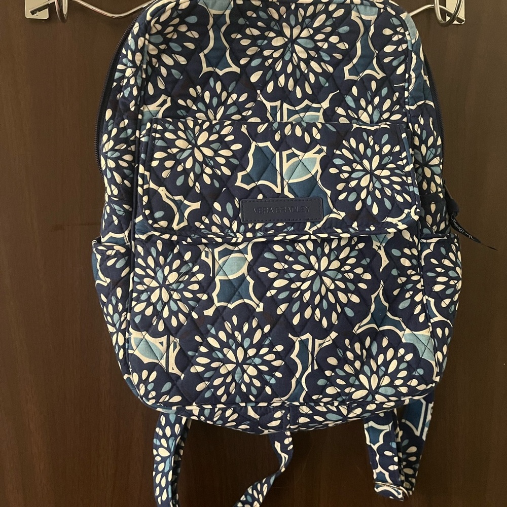 Designer purses and wristlets